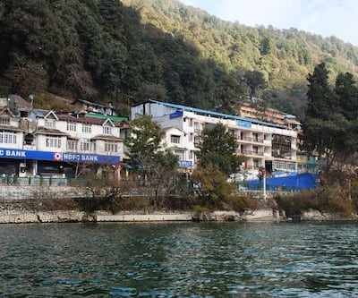 https://imgcld.yatra.com/ytimages/image/upload/t_hotel_yatra_city_desktop/v1430719301/Domestic Hotels/Hotels_Nainital/Hotel Classic The Mall/Overview-1.jpg